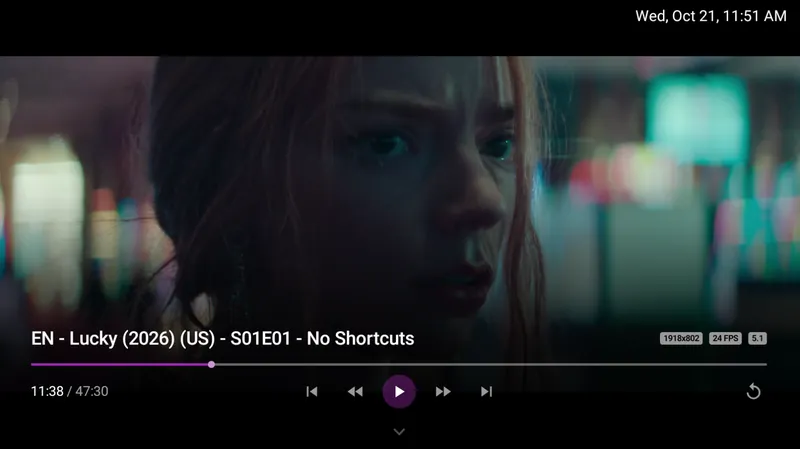 The player shows resolution, frame rate and audio on screen, with a scrub bar, skip and next episode.